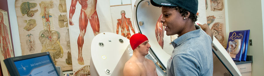 Augsburg Students using Bod Pod